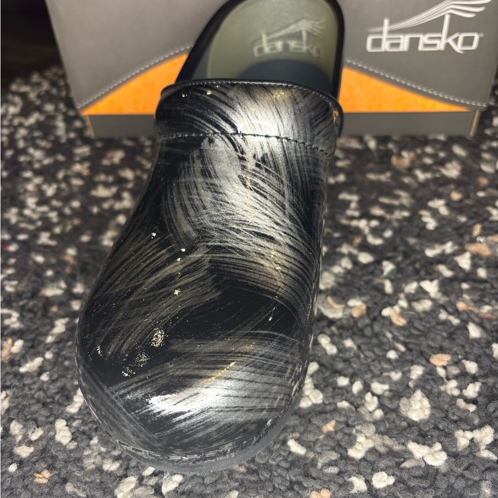 Dansko Black and Silver Clogs